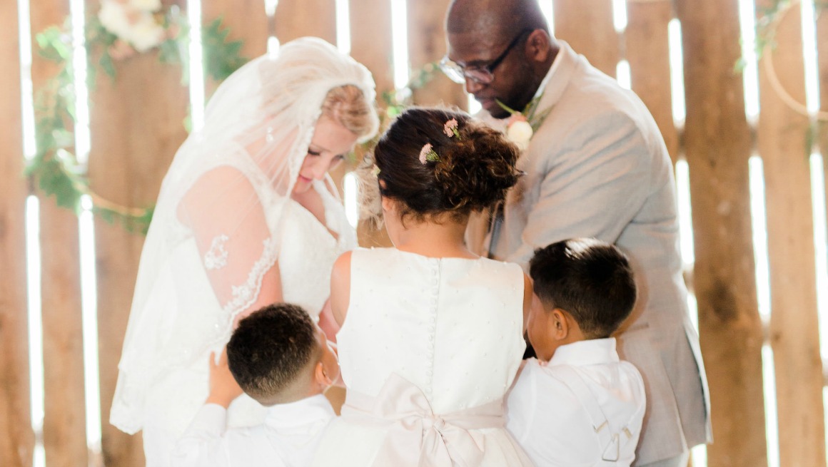 Family Blessing at Wedding Ceremony | Photo by Kaylie Plummer Photography